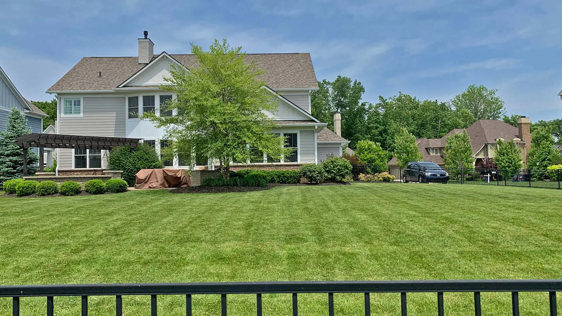Freshly trimmed shrubs and well maintained lawn in Noblesville, IN.