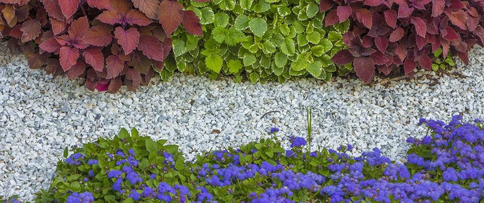 A colorful landscape bed topped with rocks by our client's home in Fishers, IN. 